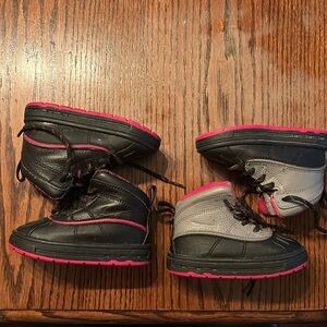 2 pairs of Nike boots
